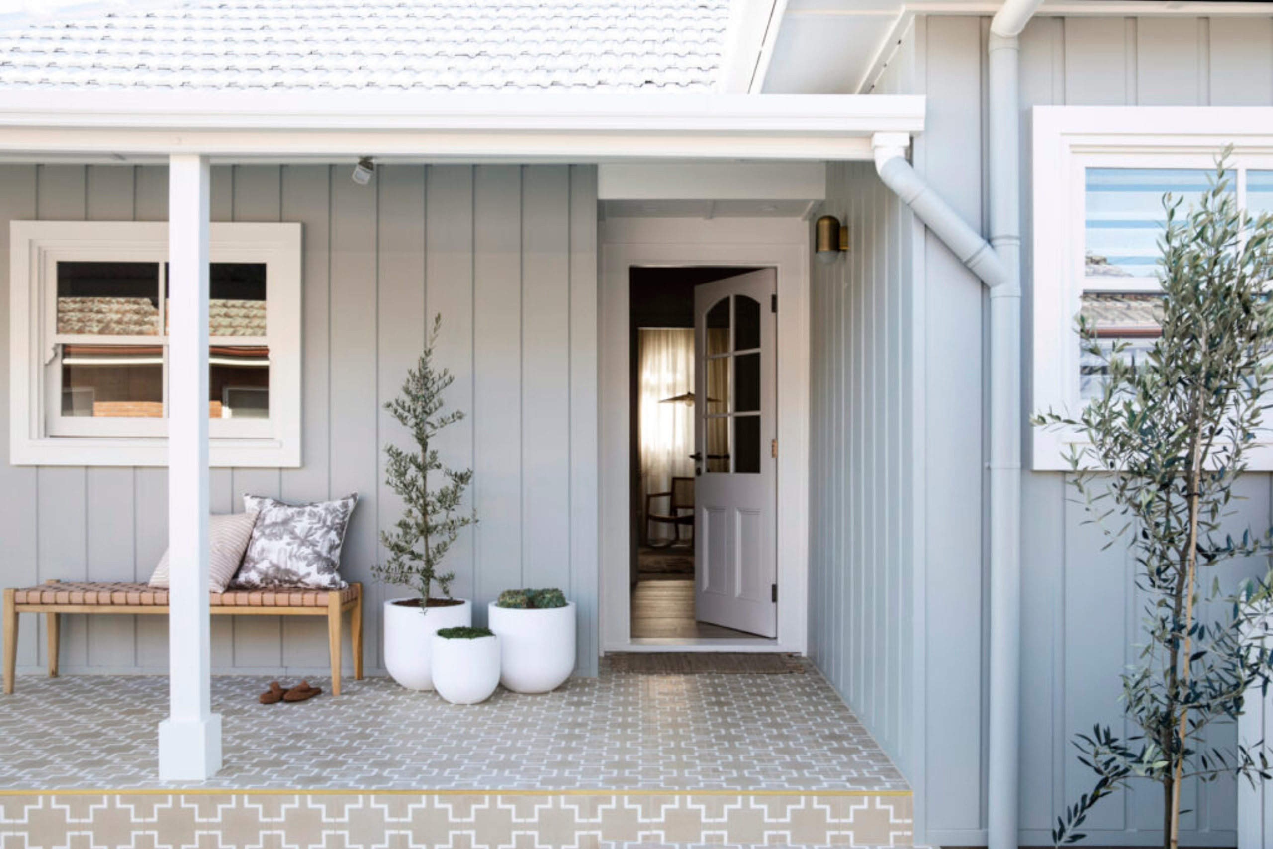 Modern home with great curb appeal due to a new coat of white paint